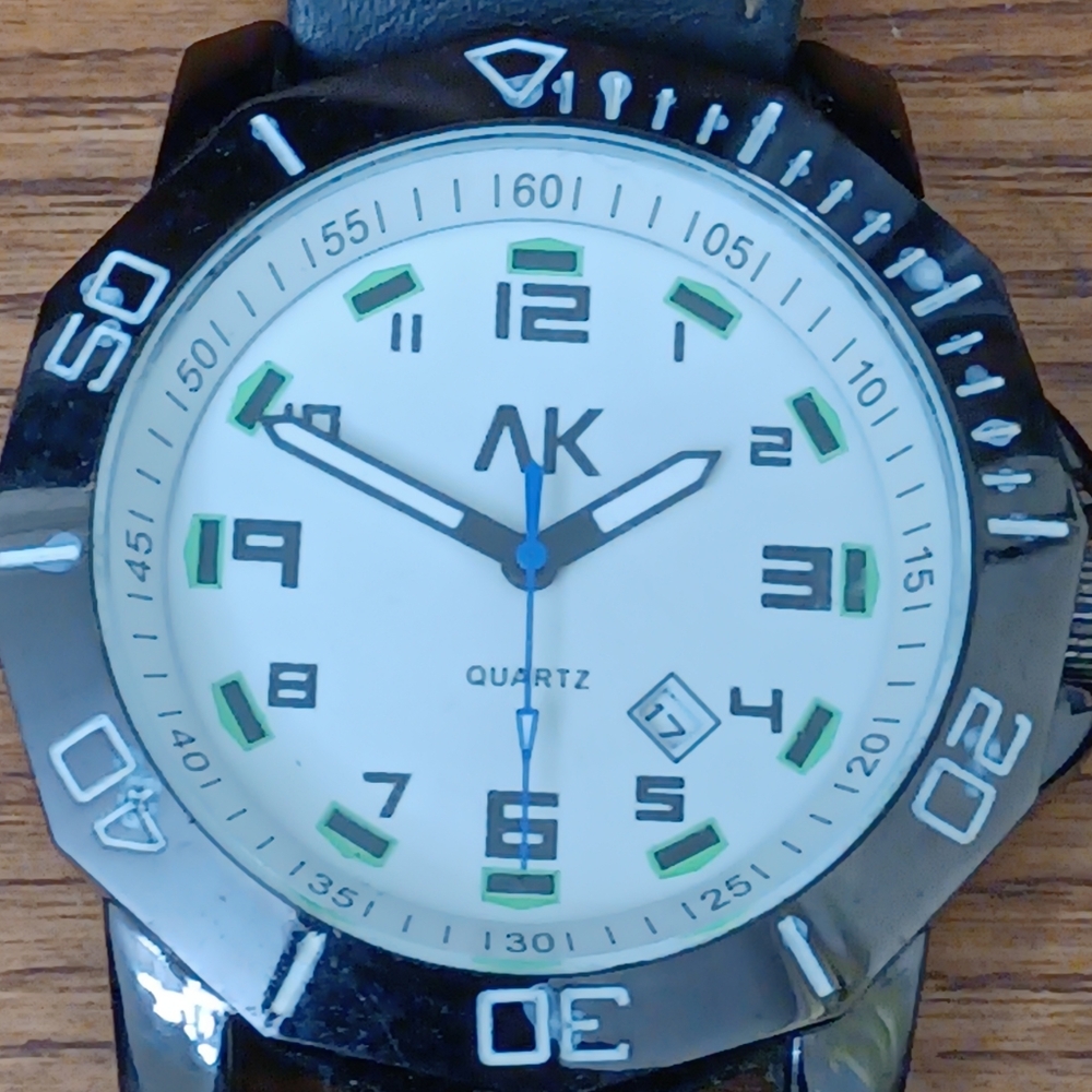 Men's Black White and Green watch